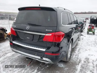 2016 Mercedes-Benz GL with VIN 4JGDF6EE2GA627631, listed as a IAAI auction lot 41706942 with 120,603 mi miles. Bid and sale history available at carsss.com. Image 4.