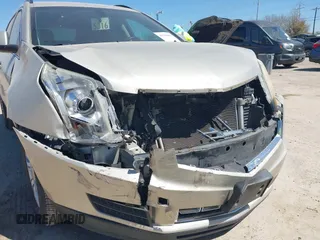 2013 Cadillac SRX z VIN 3GYFNAE33DS654844, wystawiony jako IAAI lot #41765013 z przebiegiem 117 616 mil mil oraz . Historia ofert i sprzedaży dostępna na DreamBid. Obrazek 6.