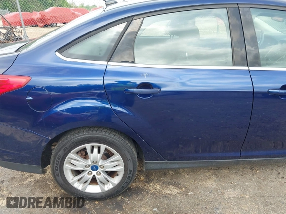 2012 Ford Focus SEL with VIN 1FAHP3H20CL135266, listed as a IAAI auction lot 42169559 with 196,104 mi miles. Bid and sale history available at carsss.com. Image 6.