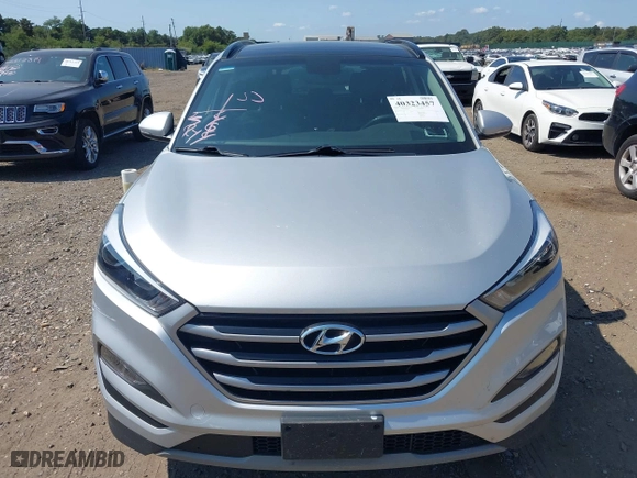 2018 Hyundai Tucson Value with VIN KM8J3CA26JU697712, listed as a IAAI auction lot 40323457 with 53,175 mi miles. Bid and sale history available at carsss.com. Image 12.