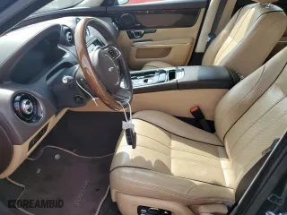 2014 Jaguar XJ with VIN SAJWJ2GD4E8V70170, listed as a Copart auction lot 69662054 with 121,188 mi miles and Non Repairable. Bid and sale history available at carsss.com. Image 7.