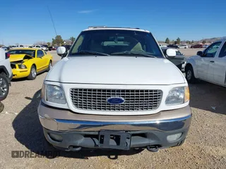 1999 Ford Expedition XLT z VIN 1FMPU18L2XLB77547, wystawiony jako IAAI lot #41161721 z przebiegiem 205 649 mil mil oraz . Historia ofert i sprzedaży dostępna na DreamBid. Obrazek 12.