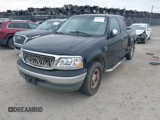 2000 Ford F-150 XL with VIN 1FTRX07W9YKB27455, listed as a IAAI auction lot 42197973 with 211,160 mi miles and . Bid and sale history available at DreamBid. Image 2.