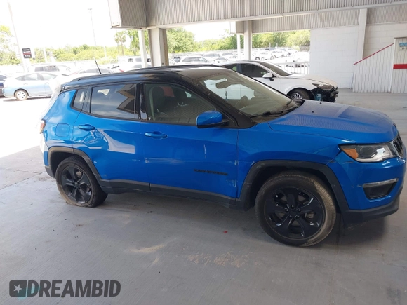 2020 Jeep Compass Altitude with VIN 3C4NJCBB3LT257440, listed as a IAAI auction lot 42115129 with 70,990 mi miles and . Bid and sale history available at carsss.com. Image 13.