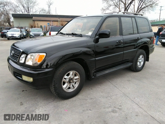 2000 Lexus LX 470 with VIN JT6HT00W8Y0100087, listed as a IAAI auction lot 41762294 with 274,720 mi miles and . Bid and sale history available at carsss.com. Image 2.