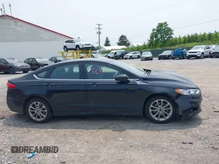 2020 Ford Fusion SE with VIN 3FA6P0LU5LR142665, listed as a IAAI auction lot 42415611 with 101,686 mi miles and . Bid and sale history available at DreamBid. Image 12.