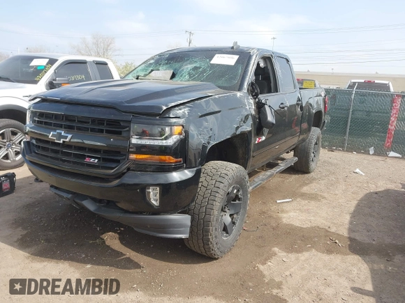 2017 Chevrolet Silverado 1500 LT with VIN 1GCVKRECXHZ157839, listed as a IAAI auction lot 42067806 with 132,135 mi miles and . Bid and sale history available at DreamBid. Image 2.