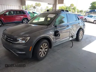 2018 Volkswagen Tiguan SEL with VIN 3VV3B7AXXJM213579, listed as a IAAI auction lot 42664339 with 84,676 mi miles and . Bid and sale history available at DreamBid. Image 2.