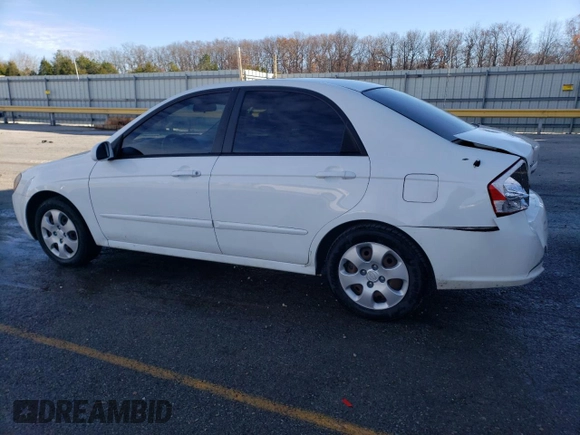 2009 Kia Spectra EX with VIN KNAFE221X95610496, listed as a Copart auction lot 82448784 with 206,627 mi miles and Salvage Title. Bid and sale history available at carsss.com. Image 2.