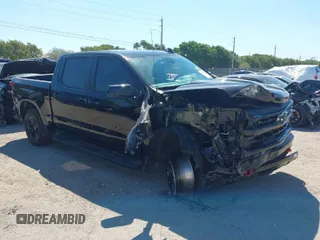 2024 Chevrolet Silverado 1500 LT Trail Boss with VIN 3GCUDFED6RG313938, listed as a IAAI auction lot 41847601 with 8,496 mi miles and . Bid and sale history available at DreamBid. Image 1.