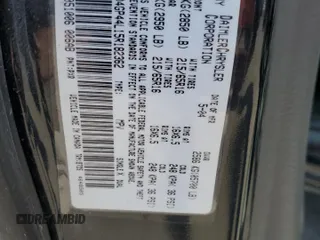 2005 Dodge Caravan SXT z VIN 2D4GP44L15R182362, wystawiony jako Copart lot #54702625 z przebiegiem 185 114 mil mil oraz Szkody całkowita. Historia ofert i sprzedaży dostępna na DreamBid. Obrazek 13.