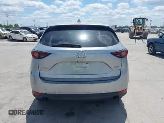 2017 Mazda CX-5 Sport with VIN JM3KFABLXH0135560, listed as a IAAI auction lot 42062016 with 153,416 mi miles. Bid and sale history available at carsss.com. Image 17.