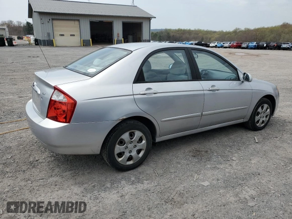 2004 Kia Spectra LX with VIN KNAFE121245031019, listed as a Copart auction lot 52960135 with 183,016 mi miles and Salvage Title. Bid and sale history available at carsss.com. Image 3.