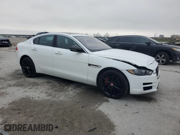 2019 Jaguar XE 25t with VIN SAJAS4FX5KCP51107, listed as a Copart auction lot 44332255 with 101,036 mi miles and Salvage Title. Bid and sale history available at carsss.com. Image 4.