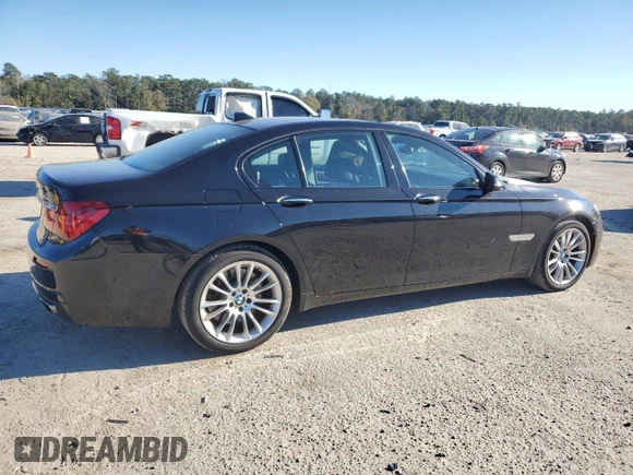 2015 BMW 7 Series 750i xDrive with VIN WBAYB6C57FD965993, listed as a Copart auction lot 83871924 with 76,720 mi miles and Salvage Title. Bid and sale history available at carsss.com. Image 3.