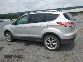 2013 Ford Escape Titanium with VIN 1FMCU9J9XDUB88989, listed as a Copart auction lot 64994445 with 192,833 mi miles and Salvage title. Bid and sale history available at DreamBid. Image 2.