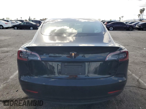 2023 Tesla Model 3 z VIN 5YJ3E1EA3PF713735, wystawiony jako Copart lot #51821995 z przebiegiem Nie podano mil oraz Szkoda całkowita • Salvage title. Historia ofert i sprzedaży dostępna na DreamBid. Obrazek 6.