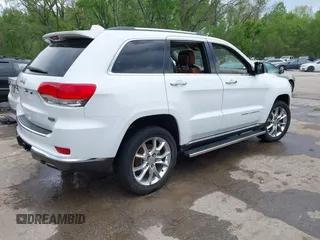 2015 Jeep Grand Cherokee Summit with VIN 1C4RJFJG5FC104087, listed as a IAAI auction lot 42100298 with 88,710 mi miles and . Bid and sale history available at DreamBid. Image 4.