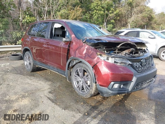 2021 Honda Passport EX-L with VIN 5FNYF7H55MB015305, listed as a IAAI auction lot 41672601 with 74,788 mi miles. Bid and sale history available at carsss.com. Image 1.