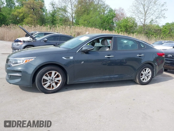 2016 Kia Optima LX with VIN KNAGT4L37G5073752, listed as a IAAI auction lot 42132621 with 136,818 mi miles. Bid and sale history available at carsss.com. Image 14.