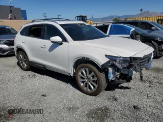 2019 Mazda CX-9 Grand Touring with VIN JM3TCBDY4K0303079, listed as a Copart auction lot 52557565 with 72,946 mi miles and Salvage Title. Bid and sale history available at DreamBid. Image 4.