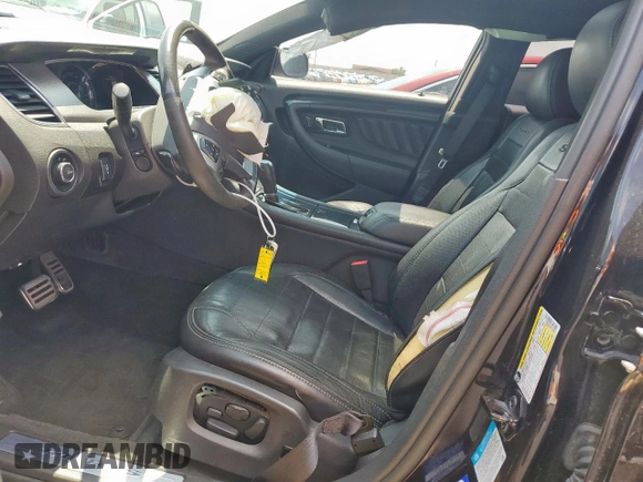 2014 Ford Taurus SHO z VIN 1FAHP2KT4EG106957, wystawiony jako Copart lot #59364185 z przebiegiem 113 704 mil mil oraz Szkoda całkowita • Salvage title. Historia ofert i sprzedaży dostępna na DreamBid. Obrazek 7.