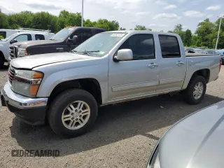 2011 GMC Canyon SLE1 z VIN 1GTH6MFE5B8111837, wystawiony jako Copart lot #60858125 z przebiegiem 165 012 mil mil oraz Czysty tytuł • Clean title. Historia ofert i sprzedaży dostępna na DreamBid. Obrazek 1.