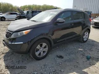 2011 Kia Sportage LX z VIN KNDPB3A21B7062172, wystawiony jako Copart lot #54608665 z przebiegiem 90 265 mil mil oraz Szkoda całkowita • Salvage title. Historia ofert i sprzedaży dostępna na DreamBid. Obrazek 1.
