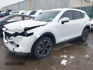 2023 Mazda CX-5 2.5 S Premium Package with VIN JM3KFBDM9P0124382, listed as a IAAI auction lot 40908008 with 25,148 mi miles. Bid and sale history available at carsss.com. Image 17.