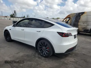 2022 Tesla Model Y Performance with VIN 7SAYGDEFXNF510418, listed as a Copart auction lot 51131465 with 16,263 mi miles and Salvage Title. Bid and sale history available at DreamBid. Image 2.