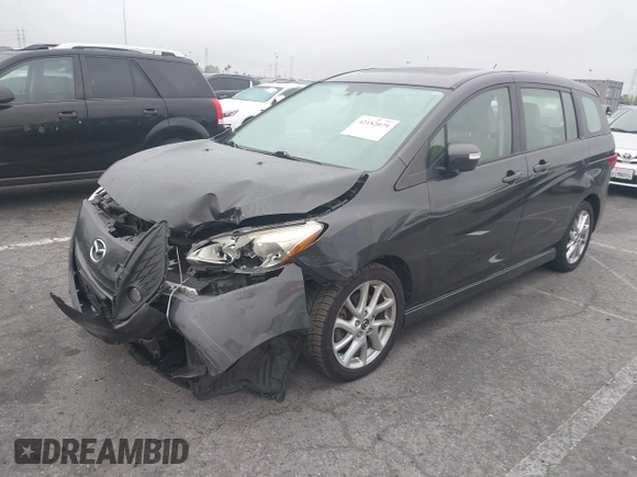 2013 Mazda 5 Grand Touring with VIN JM1CW2DL9D0158077, listed as a IAAI auction lot 42182079 with 153,431 mi miles and . Bid and sale history available at DreamBid. Image 2.
