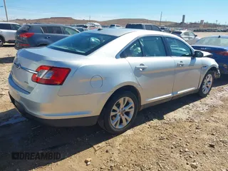 2011 Ford Taurus SEL with VIN 1FAHP2EW5BG133814, listed as a IAAI auction lot 41608224 with 127,075 mi miles. Bid and sale history available at carsss.com. Image 4.