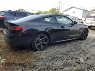 2022 BMW 4 Series 430i xDrive with VIN WBA73AP08NCK70310, listed as a Copart auction lot 71861774 with 20,178 mi miles and Salvage Title. Bid and sale history available at DreamBid. Image 3.