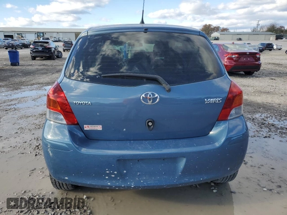 2011 Toyota Yaris with VIN JTDJT4K36B5337336, listed as a Copart auction lot 81704044 with 126,343 mi miles and Salvage Title. Bid and sale history available at carsss.com. Image 6.
