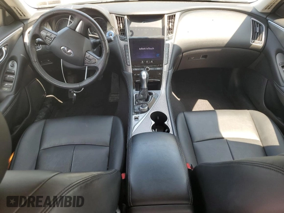 2014 Infiniti Q50 Premium с VIN JN1BV7AR4EM695652, выставлен на аукционе Copart как лот 58993595 с пробегом 94 549 миль миль и Списание • Salvage title. История ставок и продаж доступна на DreamBid. Изображение 8.