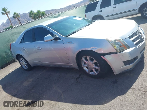 2009 Cadillac CTS RWD z VIN 1G6DU57VX90143820, wystawiony jako IAAI lot #42450086 z przebiegiem 170 656 mil mil oraz . Historia ofert i sprzedaży dostępna na DreamBid. Obrazek 13.