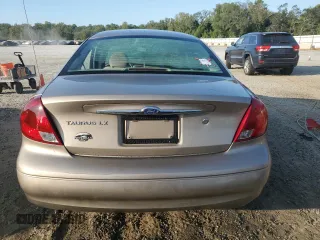 2003 Ford Taurus z VIN 1FAFP52253A170456, wystawiony jako Copart lot #70009824 z przebiegiem 216 567 mil mil oraz Szkoda całkowita • Salvage title. Historia ofert i sprzedaży dostępna na DreamBid. Obrazek 6.