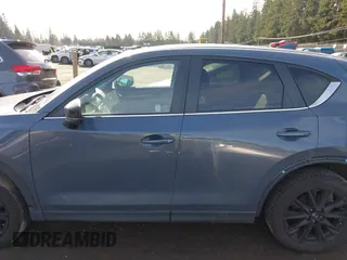 2021 Mazda CX-5 Touring with VIN JM3KFACM6M0483194, listed as a IAAI auction lot 41503907 with 41,237 mi miles. Bid and sale history available at carsss.com. Image 15.