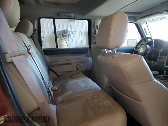2007 Jeep Commander Limited with VIN 1J8HG582X7C553502, listed as a Copart auction lot 89201285 with 184,233 mi miles and Salvage title. Bid and sale history available at DreamBid. Image 11.