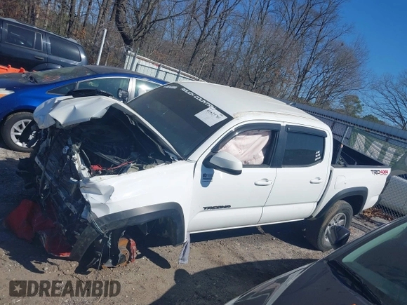 2018 Toyota Tacoma SR with VIN 5TFCZ5AN6JX144056, listed as a IAAI auction lot 41623760 with Not Provided miles and . Bid and sale history available at DreamBid. Image 13.