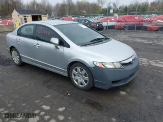 2009 Honda Civic Sdn LX with VIN 2HGFA16559H313538, listed as a IAAI auction lot 42052791 with 136,594 mi miles. Bid and sale history available at carsss.com. Image 1.