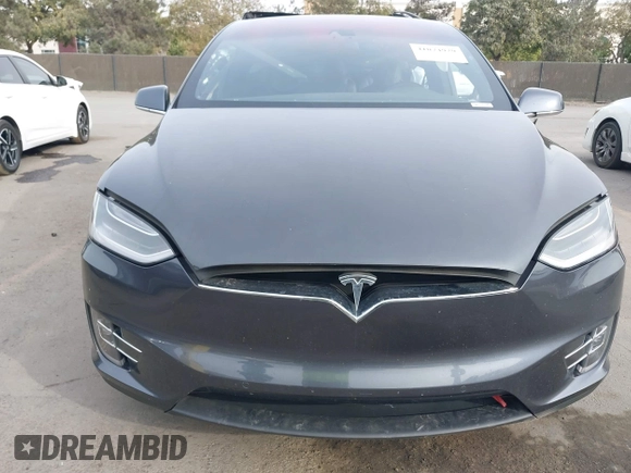 2016 Tesla Model X 70D with VIN 5YJXCAE27GF015175, listed as a IAAI auction lot 41074929 with 115,130 mi miles. Bid and sale history available at carsss.com. Image 13.