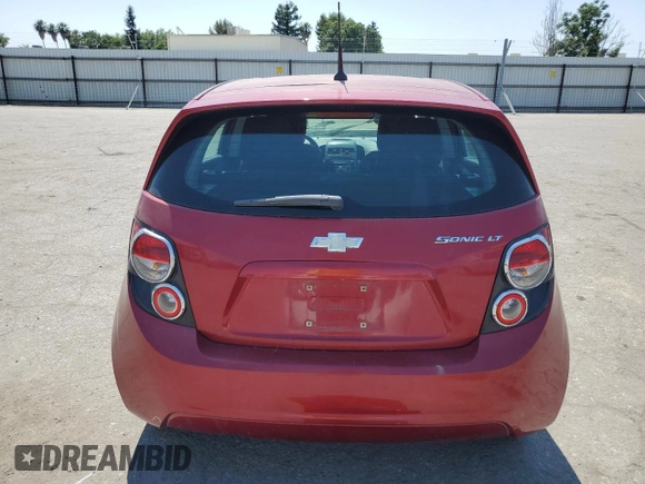 2012 Chevrolet Sonic LT with VIN 1G1JC6SH9C4133623, listed as a Copart auction lot 60065525 with 141,930 mi miles and Salvage title. Bid and sale history available at DreamBid. Image 6.