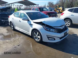 2015 Kia Optima LX z VIN KNAGM4A7XF5544925, wystawiony jako IAAI lot #41844538 z przebiegiem 102 262 mil mil oraz . Historia ofert i sprzedaży dostępna na DreamBid. Obrazek 1.