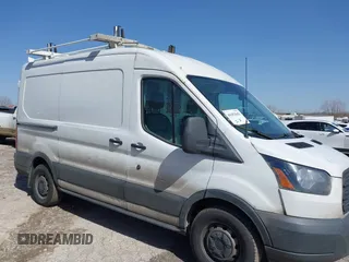 2018 Ford Transit with VIN 1FTYE1CMXJKA35806, listed as a IAAI auction lot 41652642 with 200,828 mi miles and . Bid and sale history available at DreamBid. Image 13.