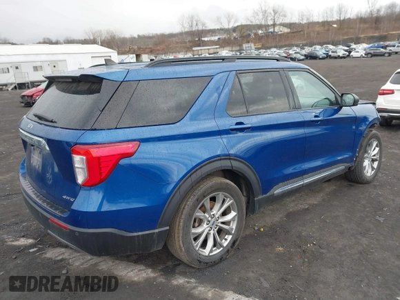 2021 Ford Explorer XLT with VIN 1FMSK8DH7MGA32857, listed as a IAAI auction lot 41877424 with 77,793 mi miles. Bid and sale history available at carsss.com. Image 4.