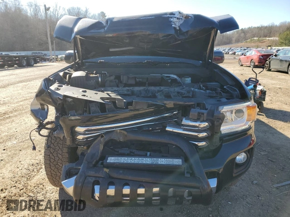 2015 GMC Canyon 4WD SLE with VIN 1GTG6BE38F1141624, listed as a Copart auction lot 42427975 with 193,511 mi miles and Salvage Title. Bid and sale history available at carsss.com. Image 5.