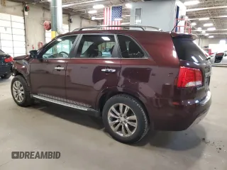 2012 Kia Sorento SX with VIN 5XYKW4A22CG297804, listed as a Copart auction lot 51800975 with 91,787 mi miles and Salvage Title. Bid and sale history available at carsss.com. Image 2.
