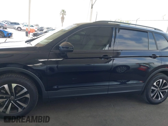 2023 Volkswagen Tiguan S with VIN 3VVRB7AX8PM068965, listed as a IAAI auction lot 42117545 with 60,121 mi miles and . Bid and sale history available at DreamBid. Image 14.