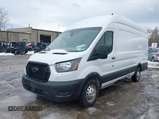 2023 Ford Transit Cargo with VIN 1FTBR3U80PKA40125, listed as a IAAI auction lot 41709473 with 83,626 mi miles and . Bid and sale history available at DreamBid. Image 18.